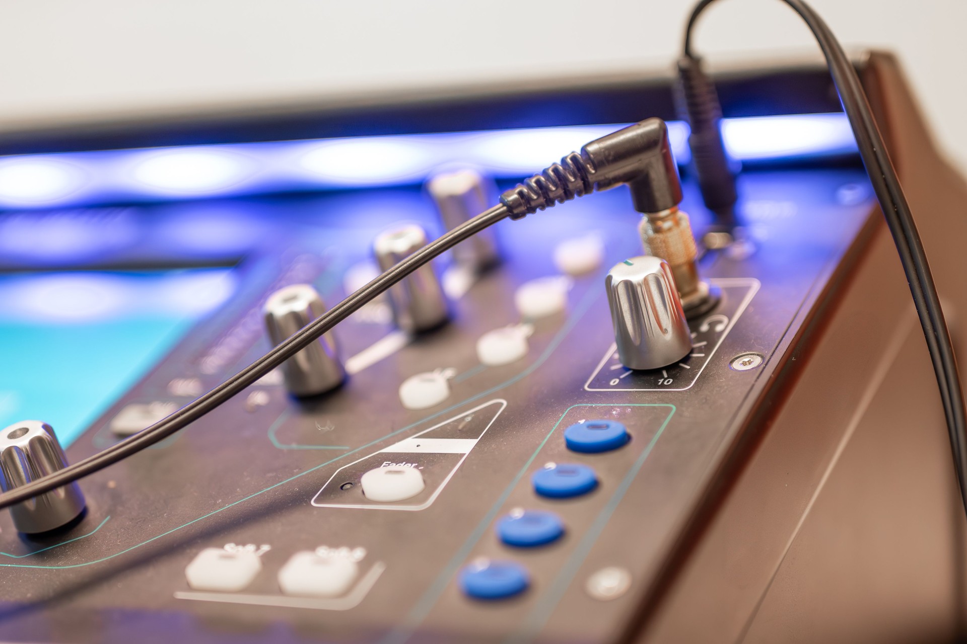 Sound engineer using digital audio mixer sliders Engineer pressing keys adds control panel volume Recording studio technician close up
